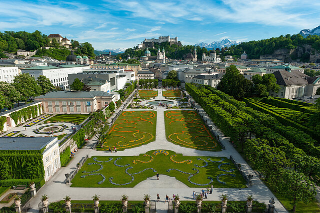 Mirabell Gardens in Salzburg in spring with a view of Hohensalzburg Fortress